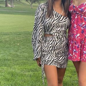 Etiquette Clothiers Zebra Print and Floral Mini Dresses